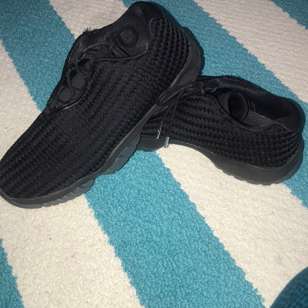 One pair or Jordan AJ Future sneakers